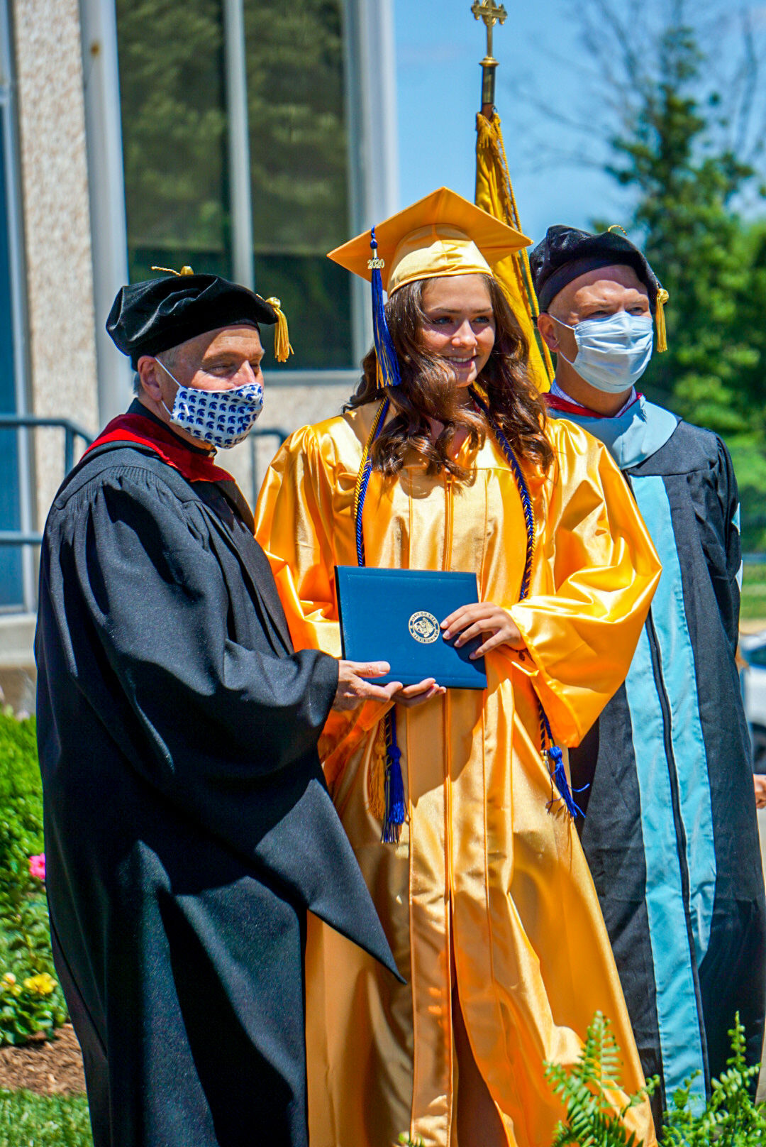 Holy Spirit drive-through diploma pickup